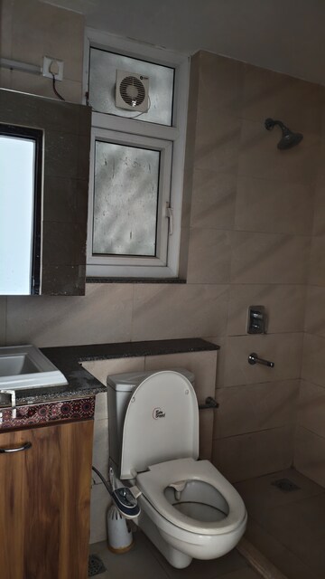 Bathroom in 3 BHK Apartment at Puri Anand Villas Phase II, Sector 81 – for Rent