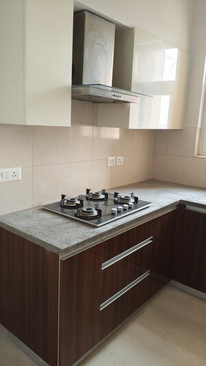 Kitchen in 3 BHK Apartment at Puri Aanandvilas, Sector 81 – for Rent