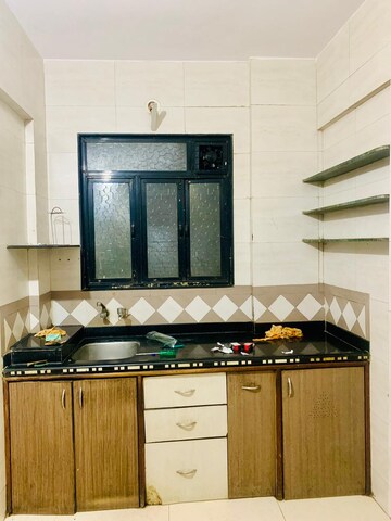 Kitchen in 1 BHK Apartment at Om Vishal Raj Apartment, Kalyan West – for Sale