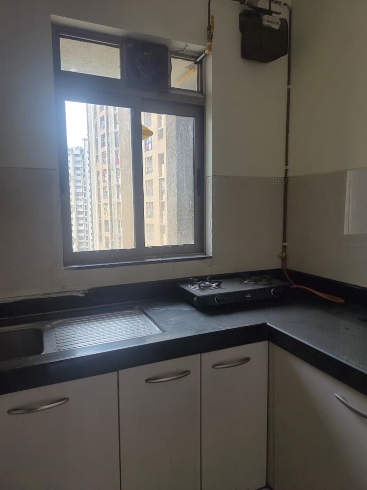 Kitchen, lodha-splendora 2 Bedroom 771 Sq.Ft. Apartment In Ghodbunder Road Thane 9696996