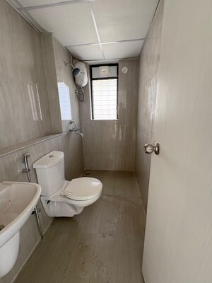Bathroom in 3 BHK Apartment at Runwal Gardens Phase 2, Dombivli East – for Rent