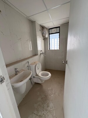 Bathroom in 3 BHK Apartment at Runwal Gardens Phase 2, Dombivli East – for Rent