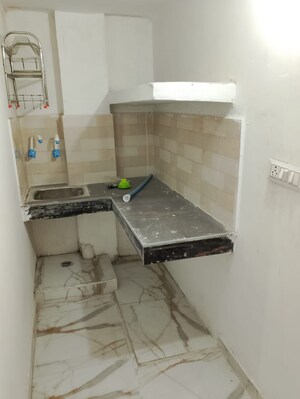 Kitchen in 1 BHK Apartment at Amrapali Dream Valley, Tech Zone 4 Greater Noida – for Rent