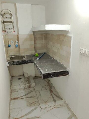 Kitchen in 1 BHK Apartment at Amrapali Dream Valley, Tech Zone 4 Greater Noida – for Rent