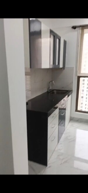 Kitchen in 1 BHK Apartment at Raymond Ten X Habitat, Pokhran Road No Two – for Rent
