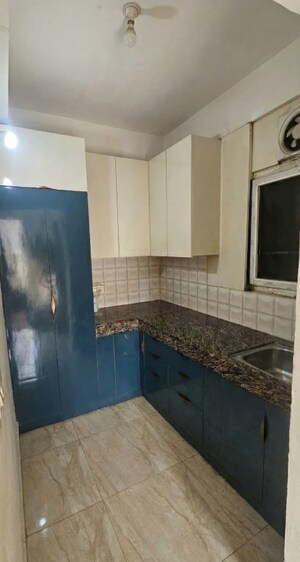 Kitchen in 2 BHK Apartment at Gaur Atulyam, Omicron I Greater Noida – for Rent