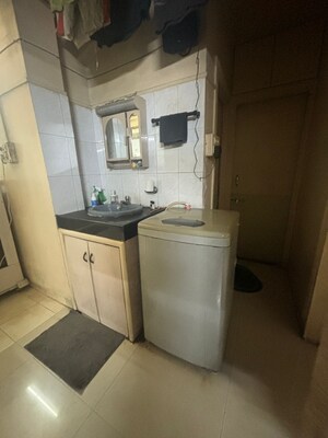 Kitchen in 1 BHK Apartment at Sakal Nagar CHS, Aundh – for Rent