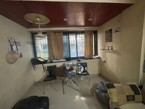 Living Room in 1 BHK Apartment at Sakal Nagar CHS, Aundh – for Rent