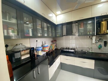 Kitchen in 2 BHK Apartment at Chintamani Pushkardeep, Warje – for Rent