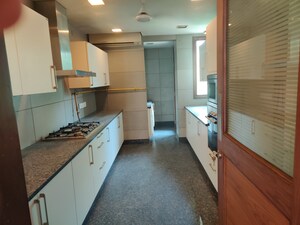 Kitchen in 4 BHK Builder Floor at Sarvodaya Enclave – for Sale