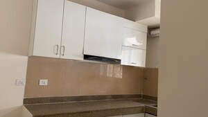 Kitchen in 4 BHK Apartment at Dhoot Time Residency, Sector 63 – for Rent