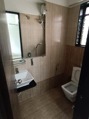 Bathroom in 2 BHK Apartment at Ani Anu Sri Balaji Enclave, Malad West – for Sale