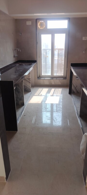Kitchen in 2 BHK Apartment at Mesacon Jewel, Andheri West – for Sale