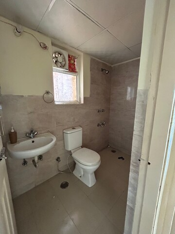 Bathroom in 2 BHK Apartment at Wave Executive Floors, Wave City – for Rent