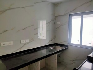 Kitchen in 2 BHK Apartment at Puneet Prime, Kurla – for Rent
