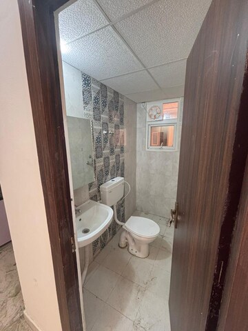 Bathroom in 2 BHK Apartment at Signature The Millennia 3, Sector 37d – for Rent