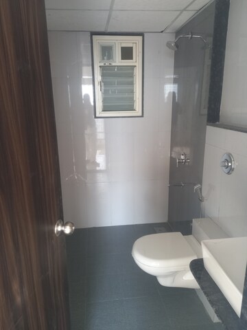 Bathroom in 3 BHK Apartment at Puravankara Silversands, Mundhwa – for Rent