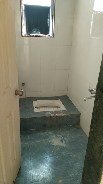 Bathroom in 2 BHK Apartment at Sai Sankul, Rahatani – for Rent