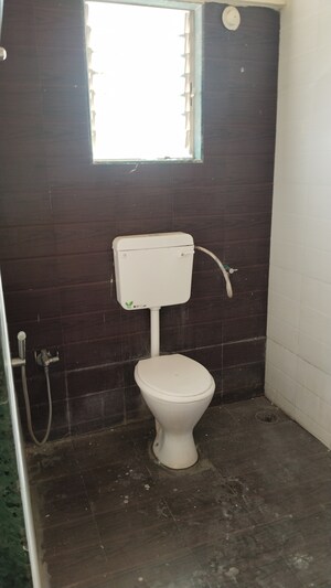 Bathroom in 2 BHK Apartment at Sai Sankul, Rahatani – for Rent