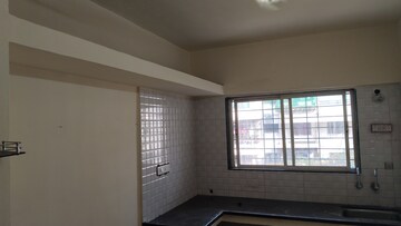 Kitchen in 2 BHK Apartment at Sai Sankul, Rahatani – for Rent