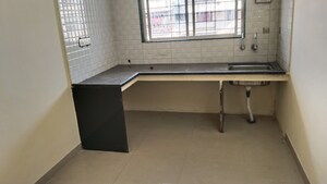 Kitchen in 2 BHK Apartment at Sai Sankul, Rahatani – for Rent