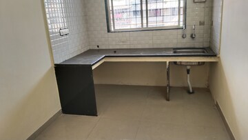 Kitchen in 2 BHK Apartment at Sai Sankul, Rahatani – for Rent