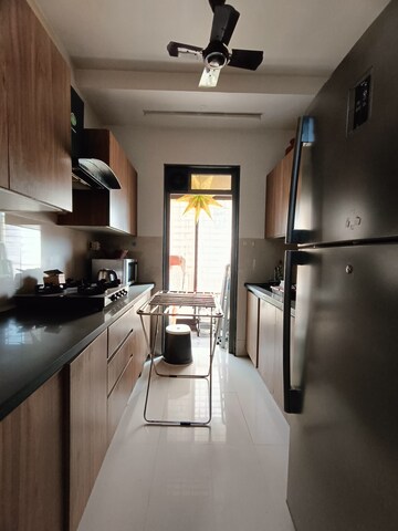 Kitchen in 1 BHK Apartment at Puranik Rumah Bali, Ghodbunder Road – for Rent