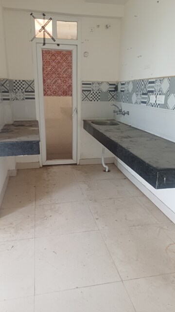 Kitchen in 2 BHK Apartment at Signature The Serenas, Sohna Sector 36 – for Rent