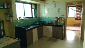Kitchen in 2 BHK Apartment at Guru Ganesh Nagar Society, Kothrud – for Rent