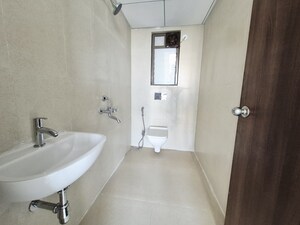 Bathroom in 1 BHK Apartment at Runwal My City Phase II Cluster 05, Dombivli East – for Rent