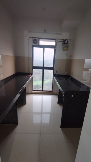 Kitchen in 1 BHK Apartment at Lodha Palava Downtown, Dombivli East – for Rent