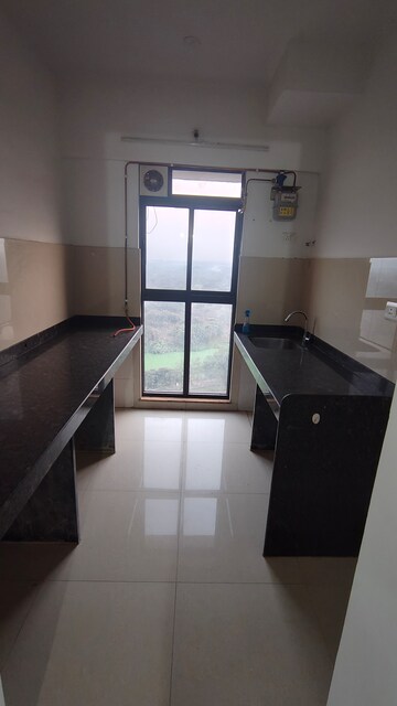 Kitchen in 1 BHK Apartment at Lodha Palava Downtown, Dombivli East – for Rent