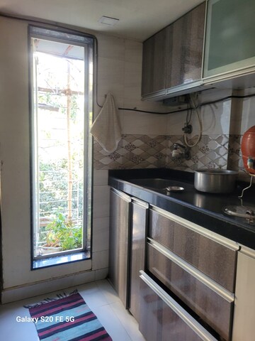 Kitchen in 2 BHK Apartment at Lok Upvan I, Manpada – for Sale