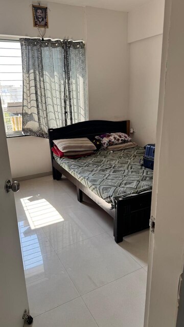 Bedroom in 2 BHK Apartment at Golden Winds, Lohgaon – for Rent