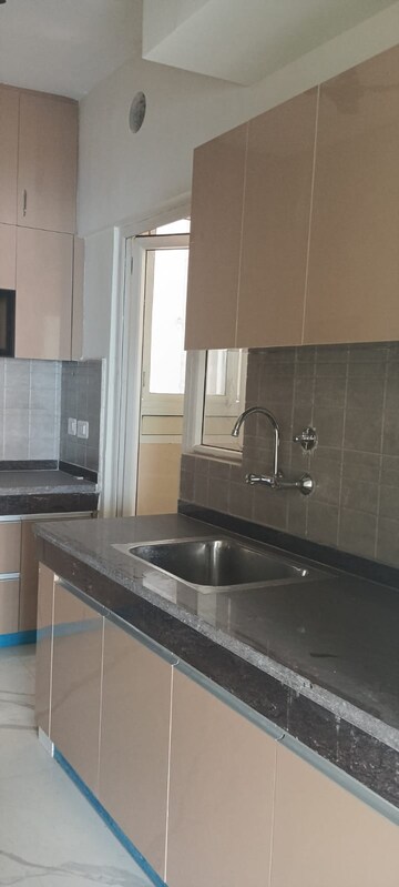 Kitchen in 4 BHK Apartment at Ace Divino, Sector 1 Greater Noida – for Rent