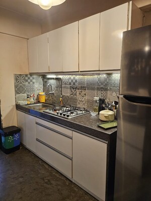 Kitchen in 2 BHK Apartment at Cosmopolis Tower, Andheri West – for Rent