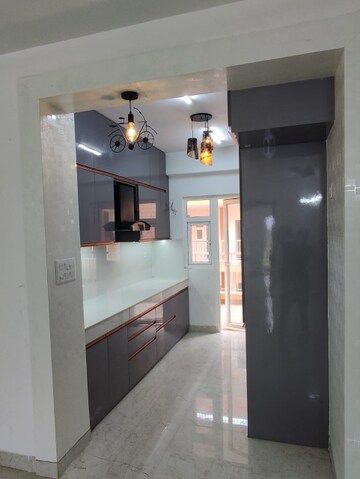 Kitchen in 4 BHK Apartment at Uninav Bliss, Raj Nagar Extension – for Rent