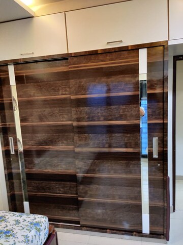 Master Bedroom in 2 BHK Apartment at Nisha Residency, Goregaon West – for Rent