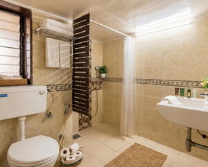 Bathroom in 1 BHK Apartment at Lokhandwala Complex – for Rent