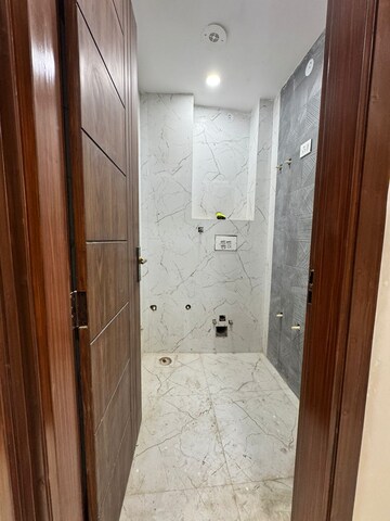 Bathroom in 3 BHK Builder Floor at Dwarka Mor – for Sale