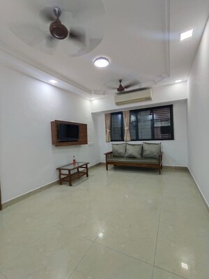 Living Room in 1 BHK Apartment at Andheri West – for Rent