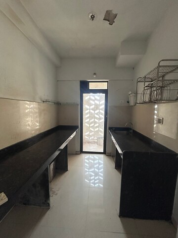 Kitchen in 2 BHK Apartment at Lodha Downtown, Dombivli East – for Rent