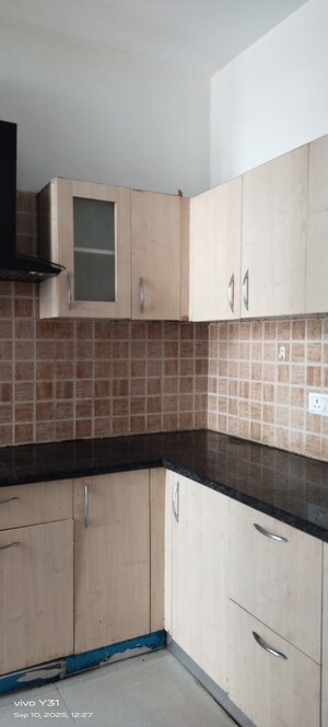 Kitchen in 3 BHK Apartment at Mahagun Mywoods, Sector 16c Greater Noida – for Rent