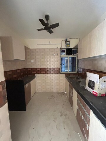 Kitchen in 2 BHK Apartment at Kalpataru Paramount, Kapur Bawdi – for Rent