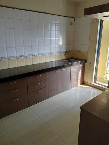 Kitchen in 3 BHK Apartment at Kesar Gardens, Kharghar – for Rent