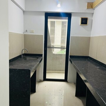 Kitchen in 1 BHK Apartment at Lodha Palava City Lakeshore Greens, Hedutane – for Sale