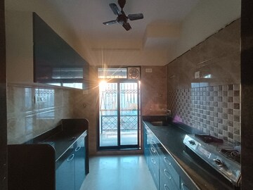 Living Room in 1 BHK Apartment at Tulsi Aura Mumbai, Ghansoli – for Rent