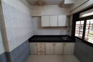 Kitchen in 2 BHK Apartment at Aum Sahil Tower, Lower Parel – for Rent