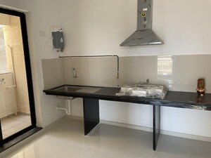 Kitchen in 3 BHK Apartment at Pride World City Kingsbury, Charholi Budruk – for Rent
