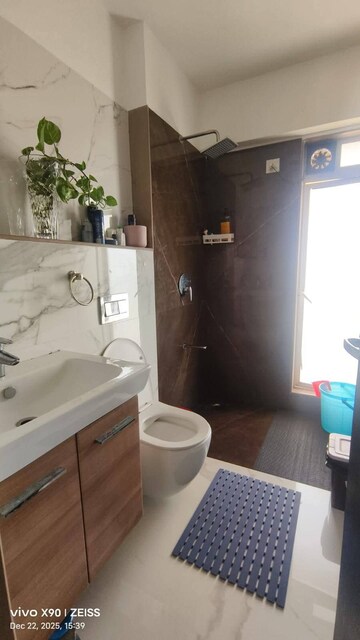 Bathroom in 2 BHK Apartment at RNA NG Eclat, Andheri West – for Rent